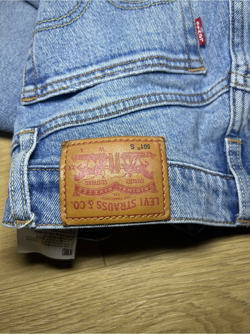 Levi's Women's Straight Leg Jeans in Light Blue Distressed Denim - Picture 2 of 8